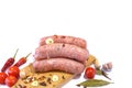 Raw pork sausages.Grilled sausages in close-up, isolated on a white background.Selective focus Royalty Free Stock Photo