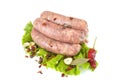 Raw pork sausages. Grilled sausages, spices close-up, isolated on a white background.Selective focus Royalty Free Stock Photo