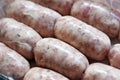 Raw pork sausages in natural casing. Royalty Free Stock Photo