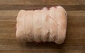 A raw Pork Shoulder cut of meat tied and scored Royalty Free Stock Photo