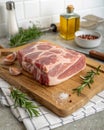Raw Pork Shoulder Square Cut on Kitchen Cutting Board Royalty Free Stock Photo