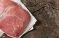 Raw pork shoulder on vintage wooden background Royalty Free Stock Photo