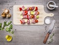 Raw pork on skewer bell peppers, onions, tomatoes and spices, with garlic sauce, tomato paste and dill seasoning, oil and bla Royalty Free Stock Photo