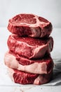 Raw Pork Stack, Steaks Pile, Fresh Uncooked Meat Slices, Raw Beef Fillet Stack Ready for Grill Royalty Free Stock Photo