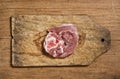 Raw Pork Steak on Board Royalty Free Stock Photo