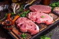 Raw pork meat steaks cooking background