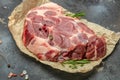 Raw pork steaks on a cutting board with spices Raw meat pork steaks with seasoning. place for text, top view Royalty Free Stock Photo