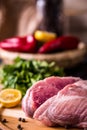 Raw pork on a wooden board