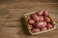 Raw potato food . Fresh potatoes on wooden background. Free place for text. Royalty Free Stock Photo