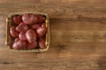 Raw potato food . Fresh potatoes on wooden background. Free place for text. Royalty Free Stock Photo