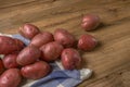 Raw potato food . Fresh potatoes on wooden background. Free place for text. Royalty Free Stock Photo