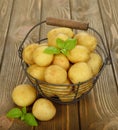 Raw potatoes in a basket Royalty Free Stock Photo