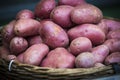 Raw potatoes in baskets on the market Royalty Free Stock Photo