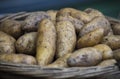 Raw potatoes in baskets on the market Royalty Free Stock Photo