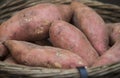 Raw potatoes in baskets on the market Royalty Free Stock Photo