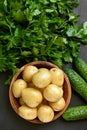 Raw potatoes in bowl Royalty Free Stock Photo