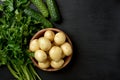 Raw potatoes on dark background Royalty Free Stock Photo