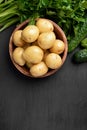 Raw potatoes in bowl Royalty Free Stock Photo