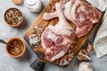 Raw poultry meat. Duck legs, garlic and spices salt and pepper Royalty Free Stock Photo