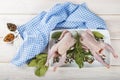Raw poussin with herbs and spices