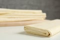 Raw puff pastry dough on white table, closeup. Space for text Royalty Free Stock Photo