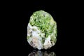 Raw pyromorphite mineral stone in front of black background
