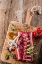 Raw Rectangle Rack of Lamb Chops on Wooden Board