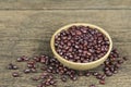 Raw red beans seed in wooden bowl on wooden table background Royalty Free Stock Photo