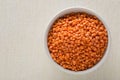 Raw red, dried lentils in white bowl Royalty Free Stock Photo