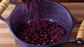 Raw red kidney bean seed grains poured into the pan