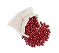 Raw red kidney beans with sackcloth bag isolated on white, top view Royalty Free Stock Photo