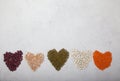 Raw red and white beans, yellow peas, mung bean, red lentils in the shape of a heart on a white background Royalty Free Stock Photo