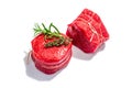 Raw Ribeye steak with fresh herbs isolated on white background. Trendy hard light, dark shadow Royalty Free Stock Photo