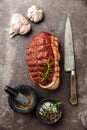 Raw roast beef Rump, seasonings and knife Royalty Free Stock Photo