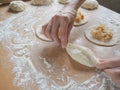 Raw pirozhki with cabbage in the cooking process. Royalty Free Stock Photo