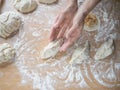 Raw pirozhki with cabbage in the cooking process. Royalty Free Stock Photo