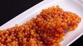 Raw Salmon Roe with Membranes Prepared for Curing.