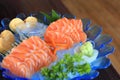 Raw salmon slice or salmon sashimi fresh serve on ice - Japanese food recipe. Royalty Free Stock Photo