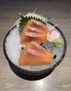 Raw salmon slice or salmon sashimi in Japanese style fresh serve on ice with fresh wasabi Royalty Free Stock Photo