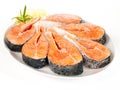 Raw salmon steaks on a plate