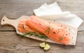 Raw salmon steaks on the wooden board Royalty Free Stock Photo