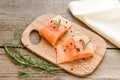 Raw salmon steaks on the wooden board Royalty Free Stock Photo