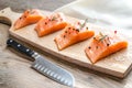 Raw salmon steaks on the wooden board Royalty Free Stock Photo