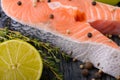 Raw salmon with thyme, pepper and lime Royalty Free Stock Photo