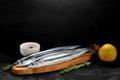 Raw saury on a wooden Board Royalty Free Stock Photo