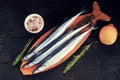 Raw saury on a wooden Board Royalty Free Stock Photo