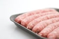 Raw sausage and packaging Royalty Free Stock Photo