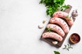 Raw sausages with spices and rosemary Royalty Free Stock Photo