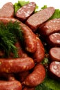 Raw sausages and vegetables Royalty Free Stock Photo