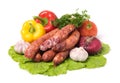 Raw sausages and vegetables Royalty Free Stock Photo